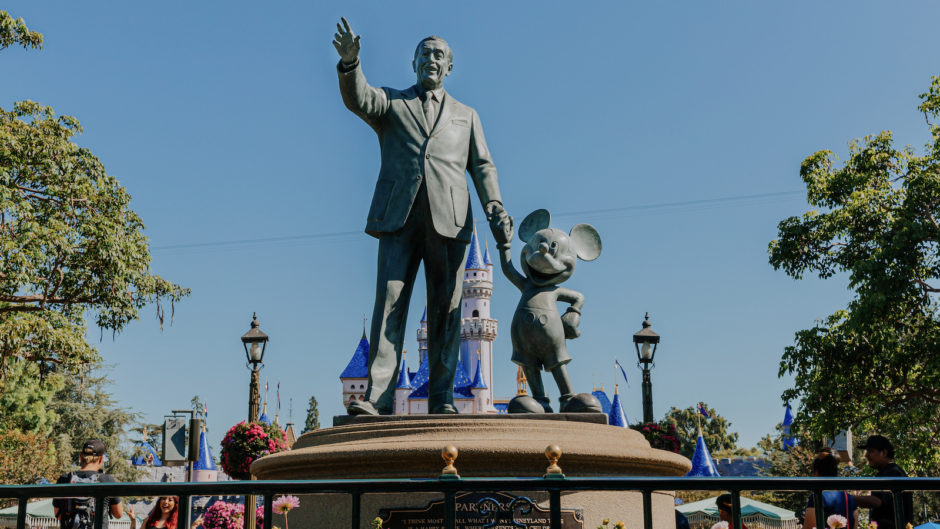 mickey painting walt statue